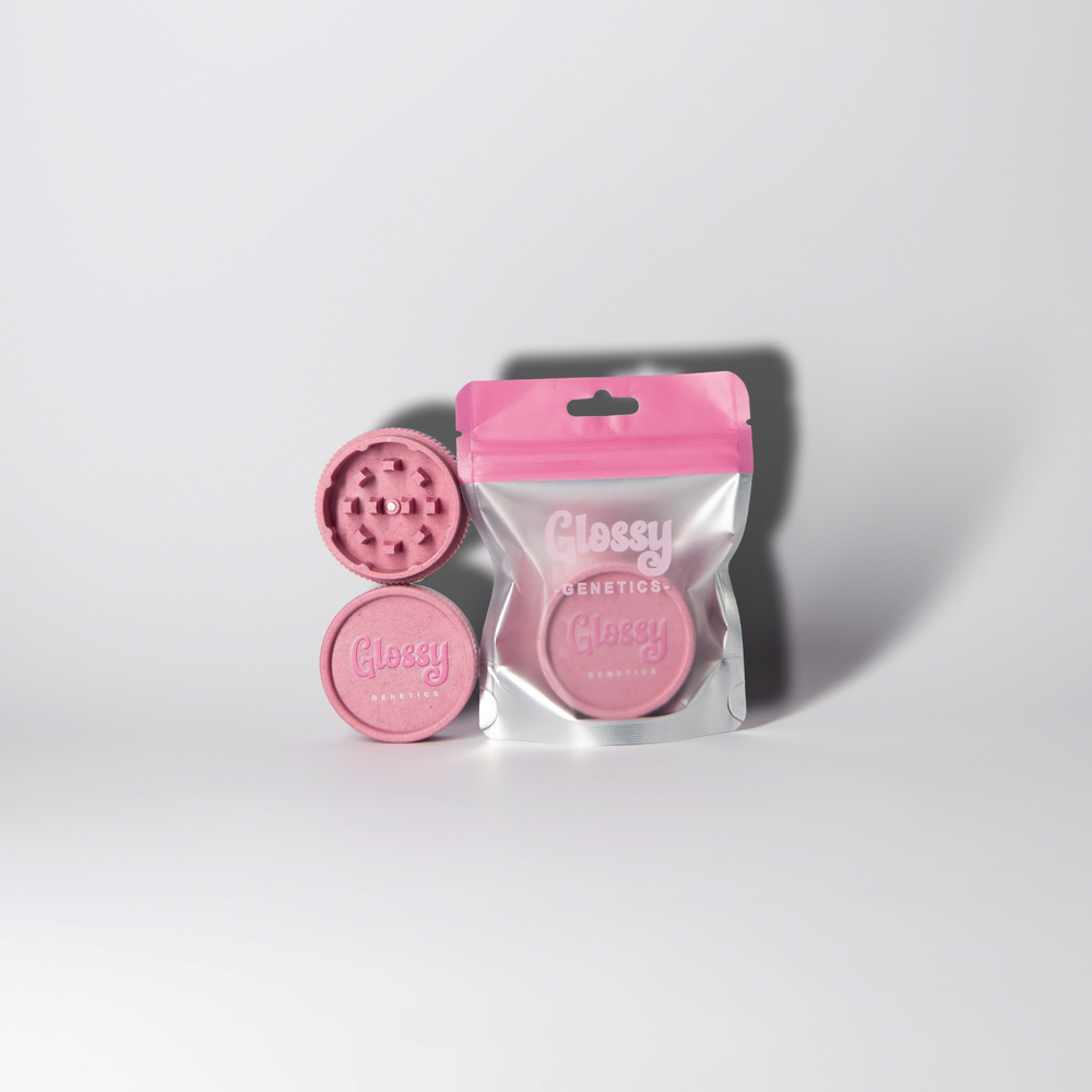 Glossy Grinder in Pink mit Verpackung, geöffnet